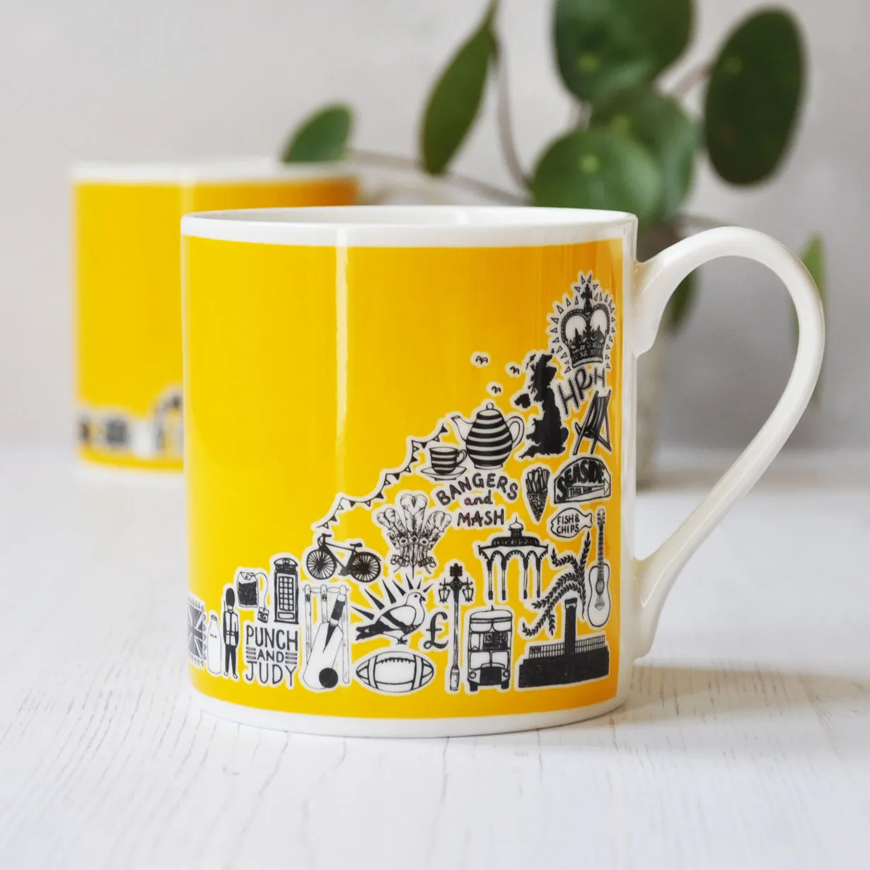 British yellow illustrated mug