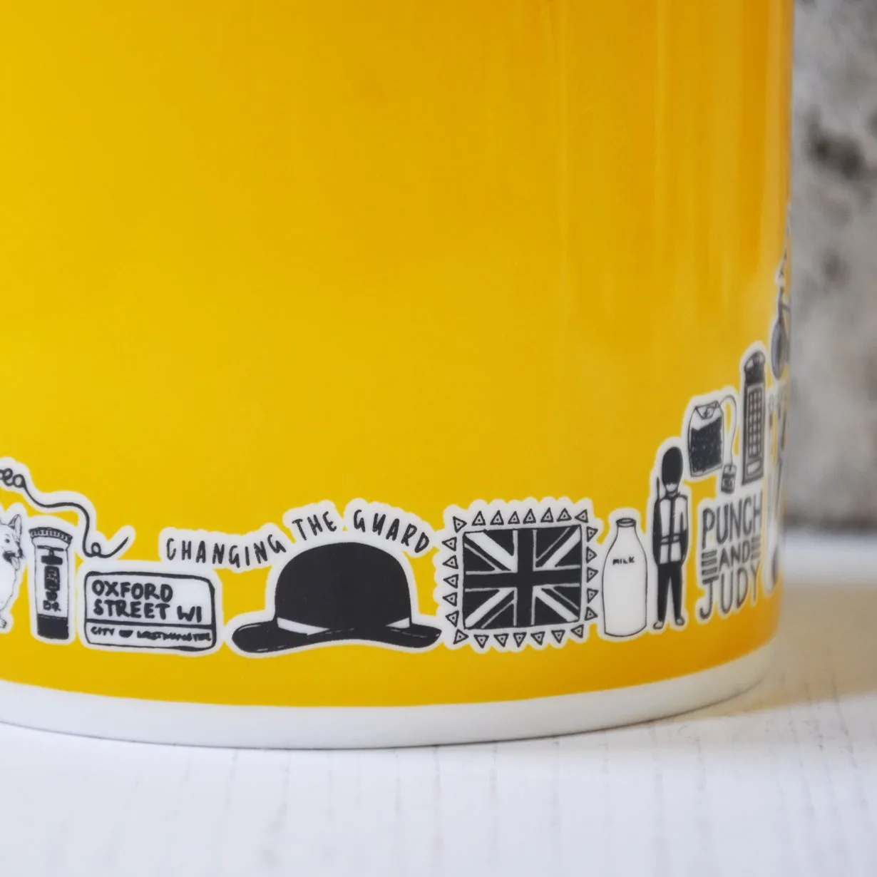 British yellow illustrated mug